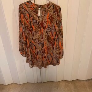 Tunic top. Med  various colors new without tags   Never worn